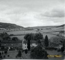 The view from Grinton Church tower of the cottages on the road from the village to Leyburn or Redmire.